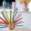 Wooden Peacock with color pencils