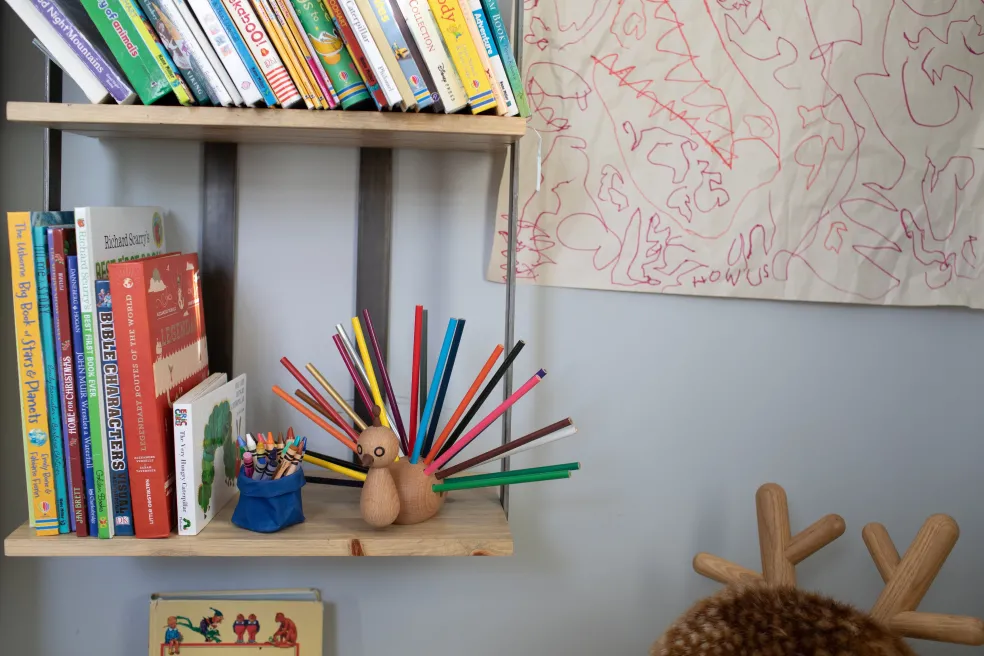 Wooden Peacock with color pencils